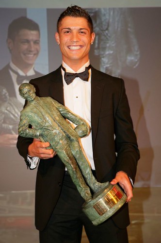Cristiano Ronaldo poses with his Sir Matt Busby Player of the Year award