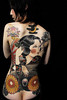 Sexy Girl With Japanese Tattoo Design On The Back Body