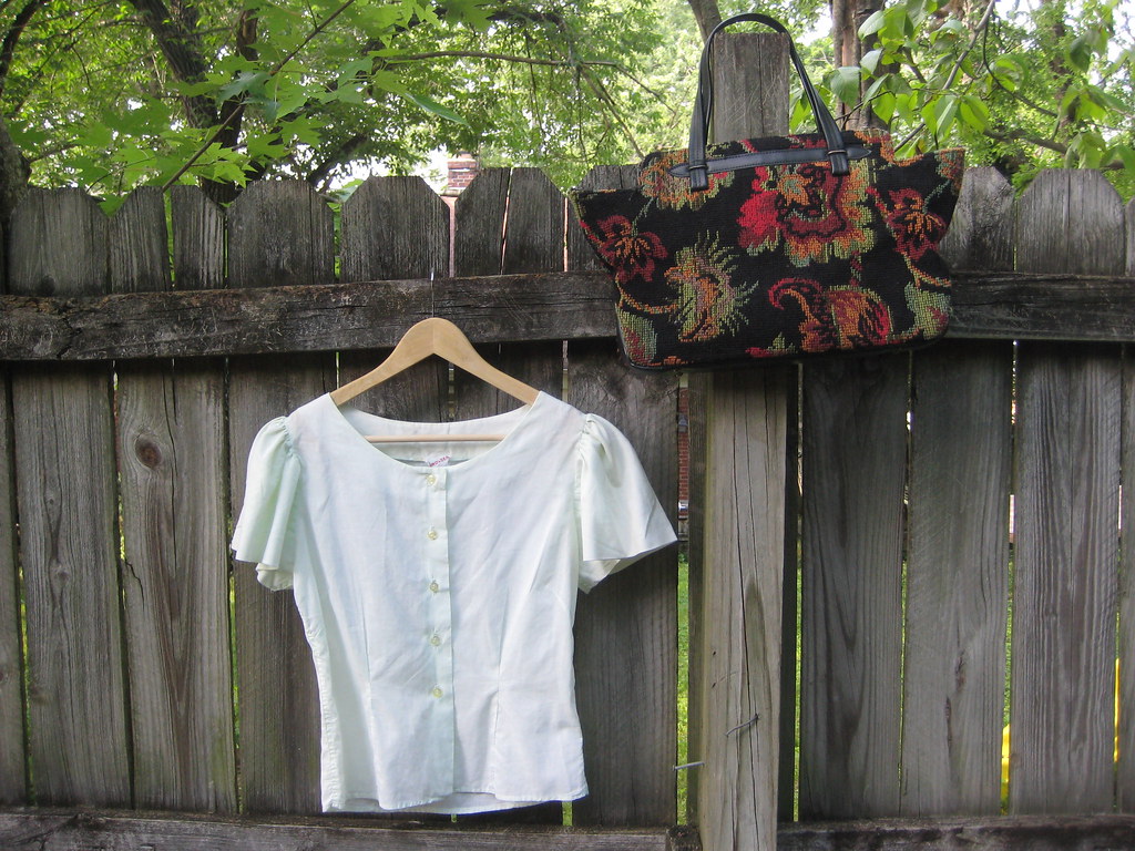 carpet bags and mint green blouses