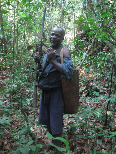 A local hunter and his shotgun in the Lomami Lualaba forest