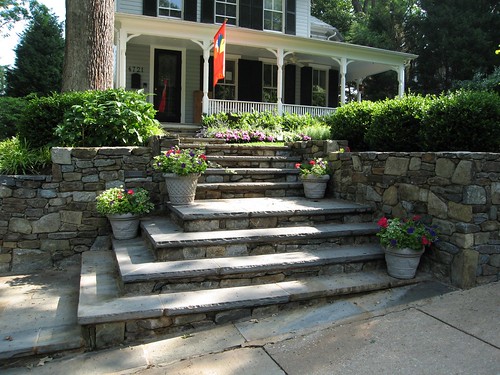 sloped front yard landscaping pictures. This house#39;s entrance has a