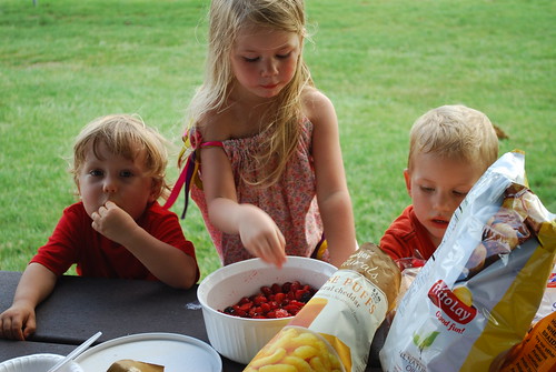 Kids hanging out by the berries