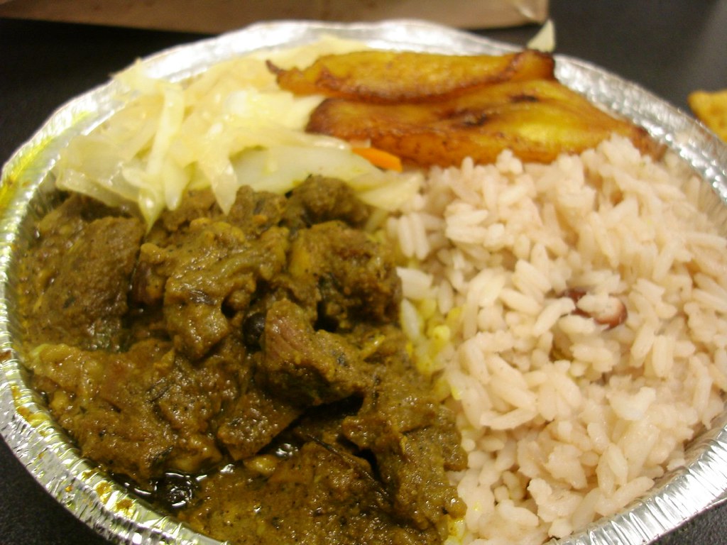 Curried Goat w/ Rice, Steamed Cabbage & Plantains