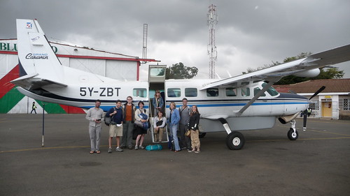Day 4: Group shot by our little plane