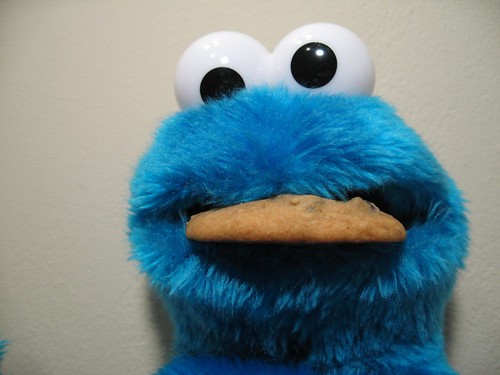cookie monster eating a cookie