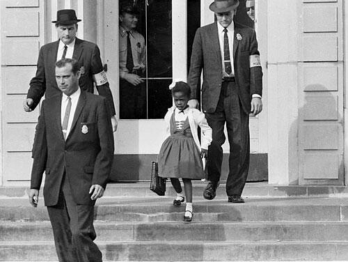 U.S. Deputy Marshals escort 6-year-old Ruby Bridges from William Frantz 