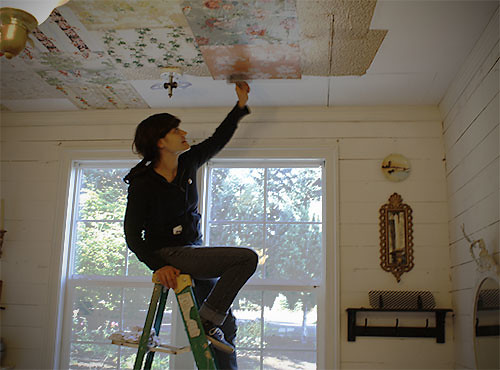 Erica Pasting Wallpaper Squares