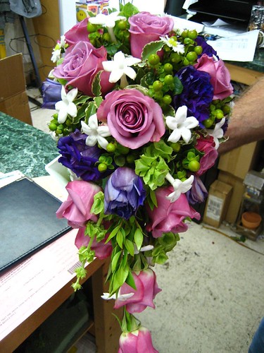 Purple Flowers in a Wedding Bouquet photo by therangonagin
