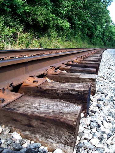 holding hands train tracks