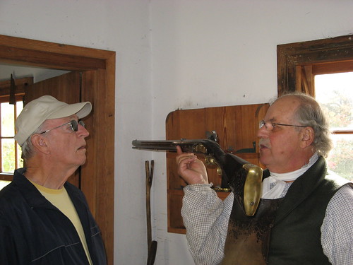 Dad checks out an old rifle