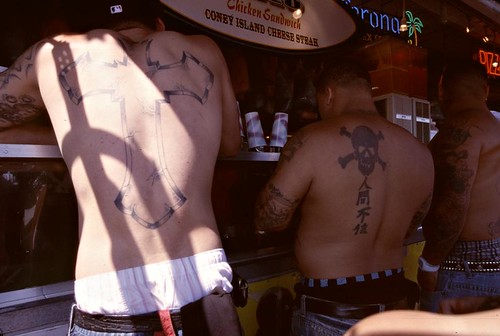 Men with back tattoos