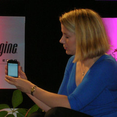 Marissa Mayer, Google's VP of Search Product & User Experience, demos her iPhone at SES Conference.