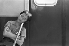 Image of a woman sleeping on a subway courtesy of Max3270