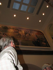 Woodward observes his artwork after installation is complete.