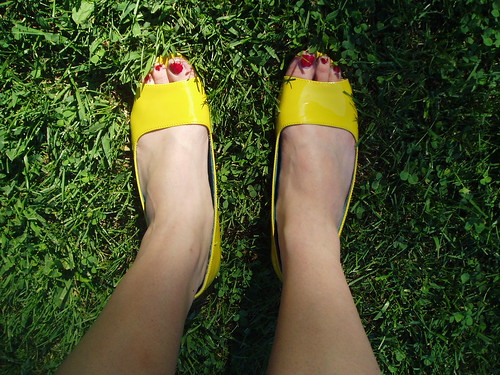 Yellow shoes on grass