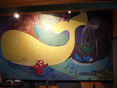 Sushi bar ki-mama, wall painting of an octopus carrying a whale