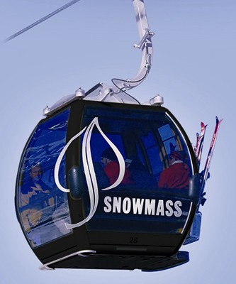 A gondola in Snowmass, Colorado taking people up to ski gondola colorado 