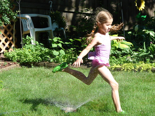 Playing in the Sprinkler