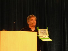 Alan Kay showing the $100 laptop ($150 currently)