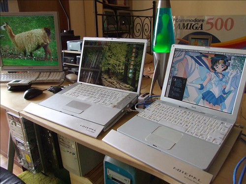 Photo from 2007 in Singapore of My MacBook Pro circa 2006, and my cute iBook G3 circa 2002, still kicking!