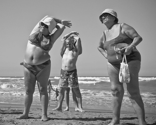 Plus size women workout at beach