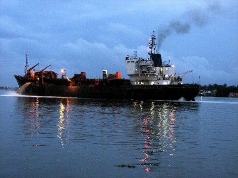 ship moving into harbour at dusk kochi 260807