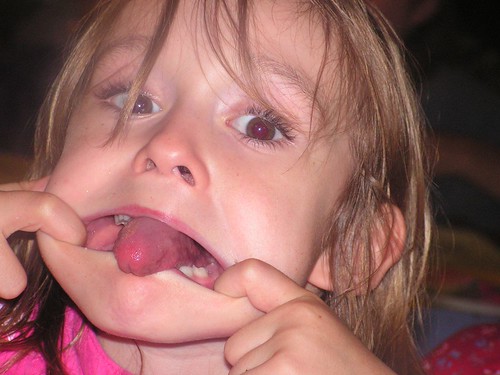  Community Child sticking her tongue out; ← Oldest photo