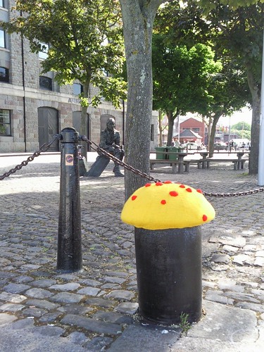 yellow and red yarn bomb mushroom