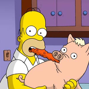 Homero y el cerdito. "Los Simpsons", la pelcula, estreno 26 de Julio de 2007.