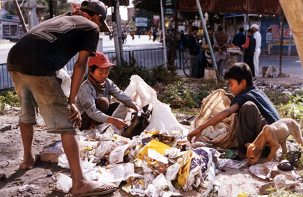 Life, Street children in Kathmandu make a living by collecting plastic and metal waste and selling it to recycling plants, 2002 by Kashish Das Shrestha