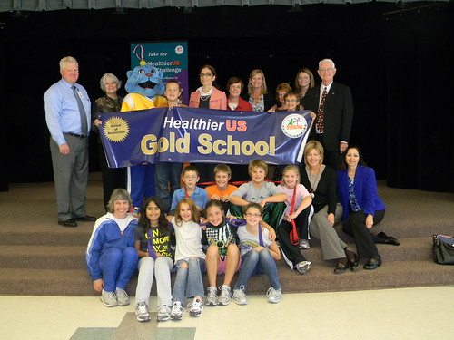 Lisa Pino celebrating with students at Phoenix Elementary in Grand Forks for earning a Gold award of Distinction in HealthierUS School Challenge 