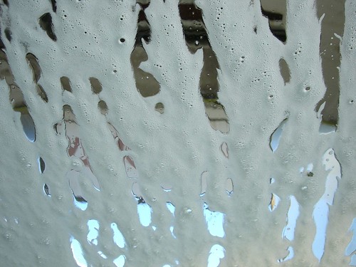 Soap on the windscreen in the carwash