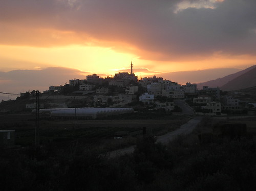sunrise over arab village