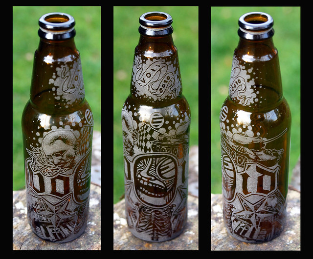 beer bottle tattoo. engraving on beer bottle. gravírozott üveg