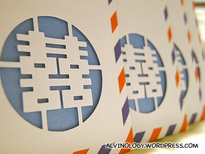 Manually punched "double happiness" paper cut on the envelop