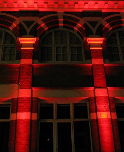 Red lit building in Belfast