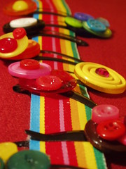 Button barrettes on rainbow ribbon 3