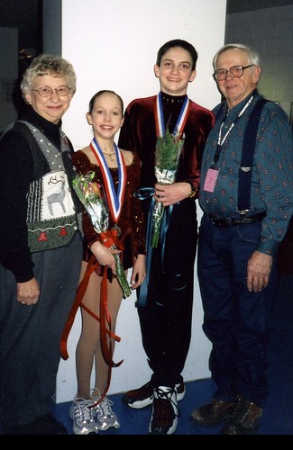 Grandma Judy and Grandpa Glenn with Christina (10) and Will (15) after the Intermediate Pairs Final at the 2000 Junior Nationals.
