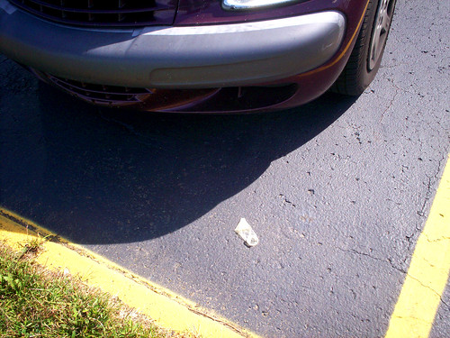 Condom in front of my car.