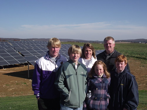 Brad Rill, Vice President of Sunnyside Farms is pictured with his wife Tracey and children Tyler, Logan, Molly and Keegan in front of the solar panel array that supports the families chicken-egg production facility in Westminster.  Sunnyside Farms gathers 29,000 dozen eggs per day.