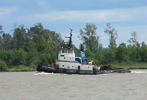 a tugboat on the fraser river in richmond