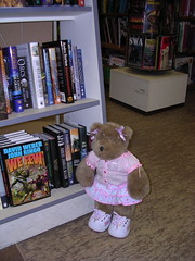 Felicia looking for books at Uncle Hugo's SF Bookstore
