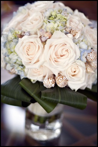  is one of the sweetest uses of seashells in a wedding bouquet I've seen