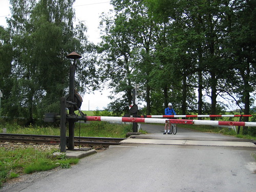 Manually operated railroad crossing