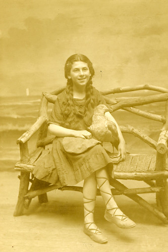 Real photo postcard, girl with faux seagull