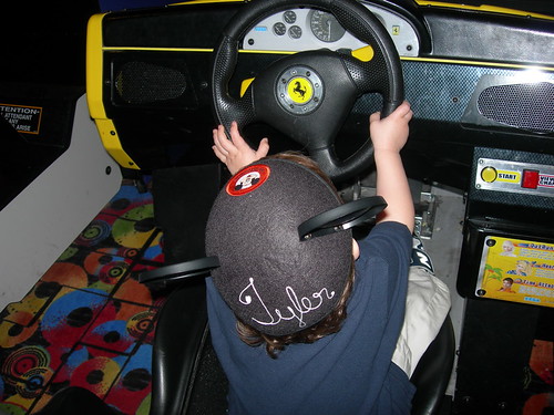 Tyler driving in arcade
