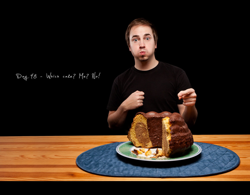 Day 98, 098/365, Project 365, Self Portrait, Strobist, cake, the cake is a lie, eat, full mouth, on black, black background, ourdailychallenge, rimllight, caught, catch, caught eating,