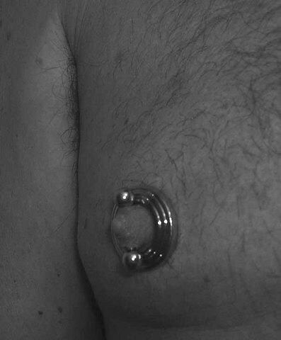 nipple piercing with a nipple shield