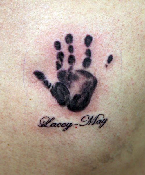 Hand Tattoo. November 3rd, 2008 | Filed under Symbol Tattoo.