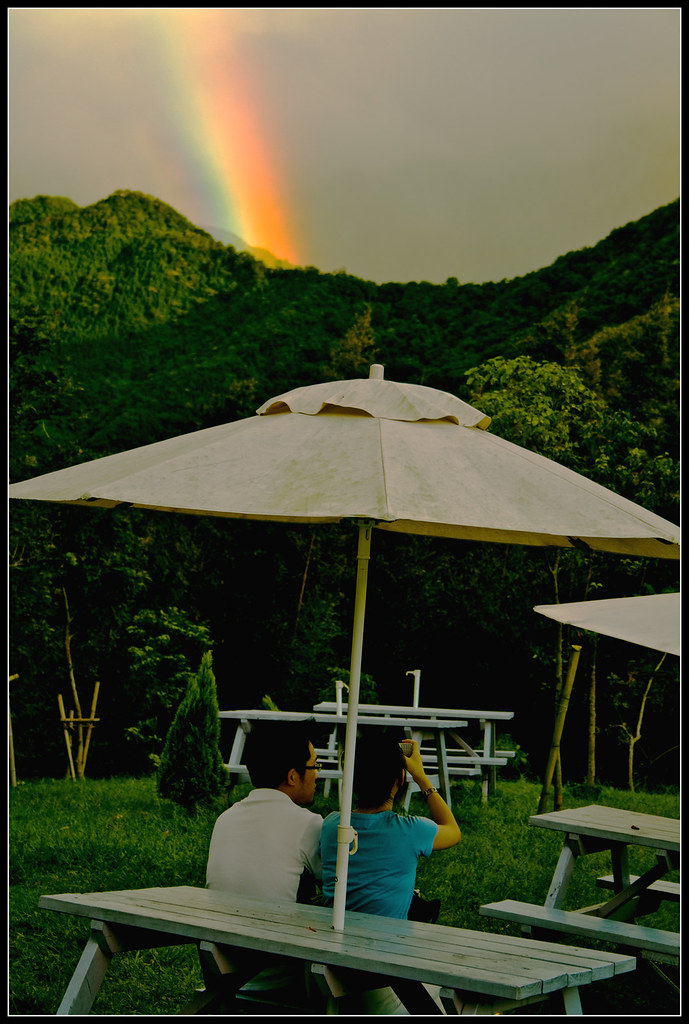 Rainbow and umbrella